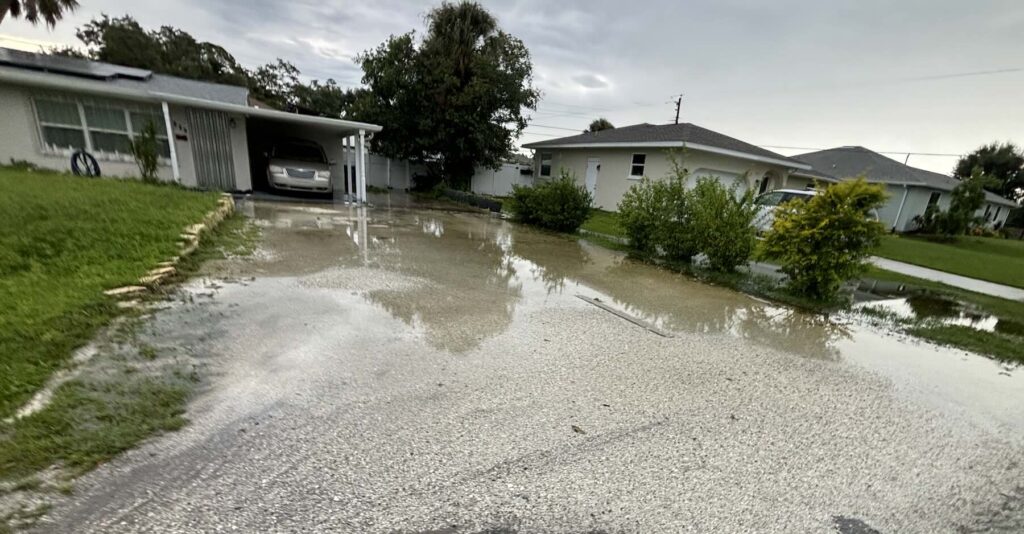 Prevent Driveway Flooding: A Rainy Season Guide 6 yard flooding - driveway pooling standing water Venice